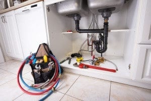 Plumbing maintenance under a sink